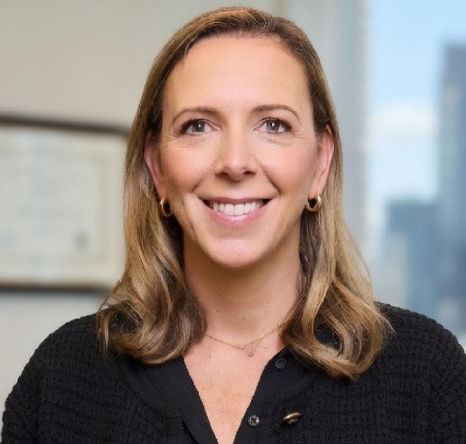 Amy Cameron, habit and wellness coach, smiling warmly